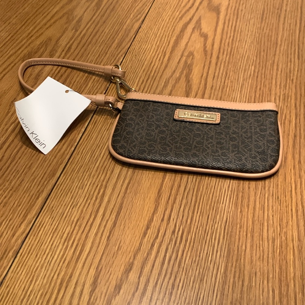 Calvin Klein small wristlet.  BROWN /TAN.  NWT!
